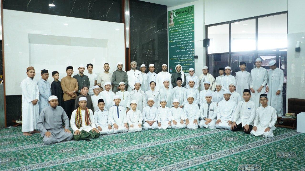 Student reading Quran in a peaceful mosque environment